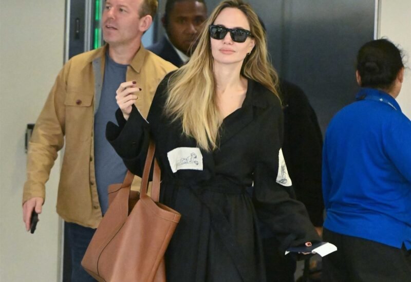 New York, NY - *EXCLUSIVE* - Angelina Jolie and her son Maddox were spotted arriving at JFK airport in New York, both looking relaxed after their flight. Pictured: Angelina Jolie