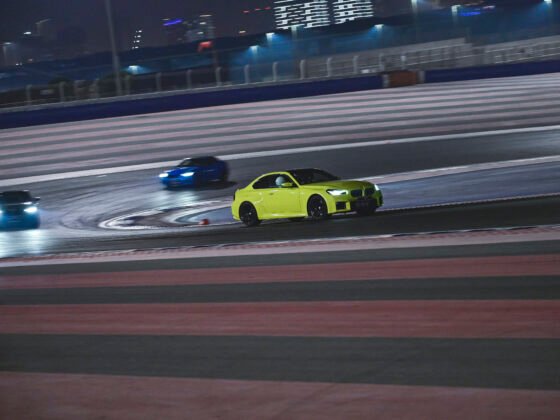 BMW cars racing on track